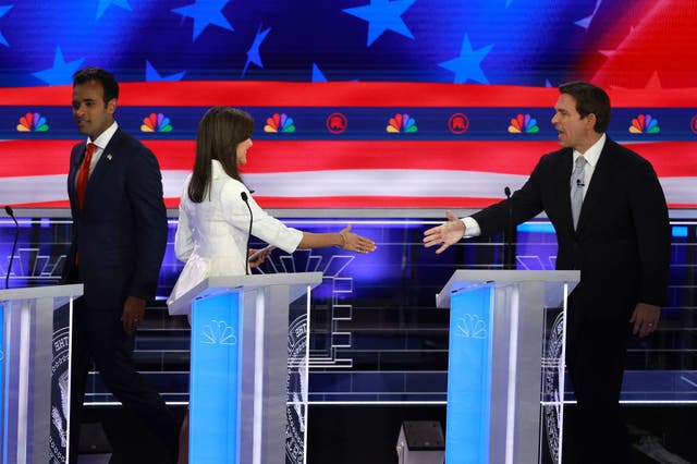 <p>Candidates shake hands after Wednesday’s Republican debate in Florida</p>