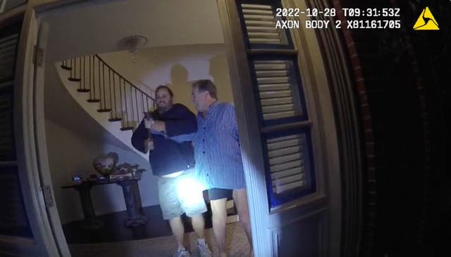 <p>In this image taken from San Francisco Police Department body-camera video, the husband of former U.S. House Speaker Nancy Pelosi, Paul Pelosi, right, fights for control of a hammer with his assailant David DePape during a brutal attack in the couple's San Francisco home on Oct. 28, 2022. Opening statements are scheduled for Thursday, Nov. 8, 2023, in the federal trial of the man accused of breaking into former House Speaker Nancy Pelosi's San Francisco home seeking to kidnap her and bludgeoning her husband with a hammer</p>