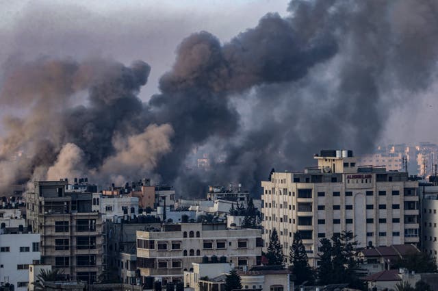 <p>Smoke rises following an Israeli airstrike in the north of the Gaza Strip</p>