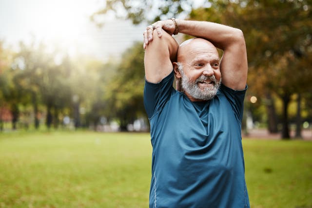 <p>An older man stretches before going on a jog (stock image). A new study, from Stanford University’s Department of Genetics, has identified biomechanical shifts that occur at specific points in the 40s and 60s </p>