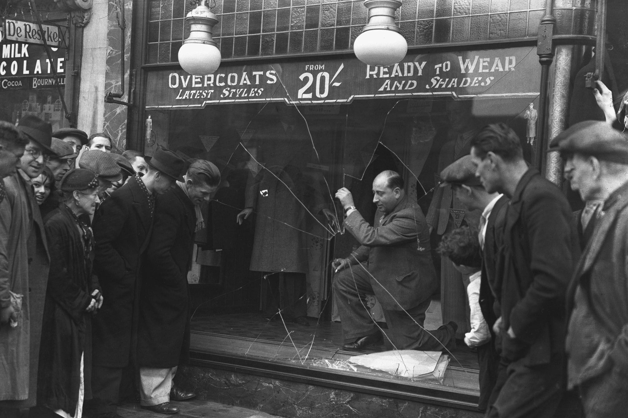 The broken window of a Jewish tailor’s shop in Bethnal Green, London, in 1936 after an antisemitic attack the previous night
