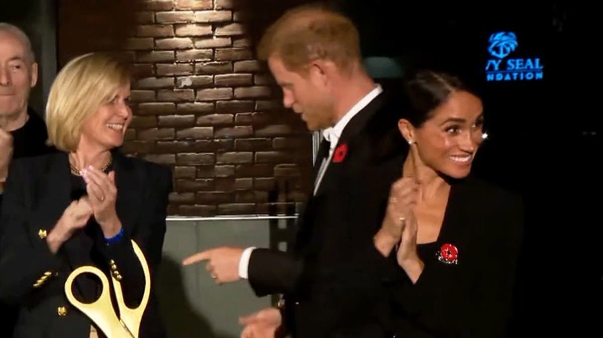 Harry and Meghan all smiles while attending Remembrance Day event