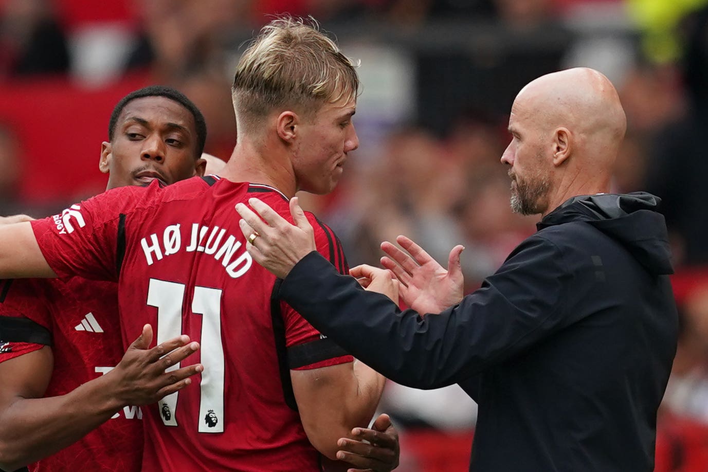 Rasmus Hojlund (centre) has backed Erik ten Hag to turn around Manchester United’s slump (Martin Rickett/PA)