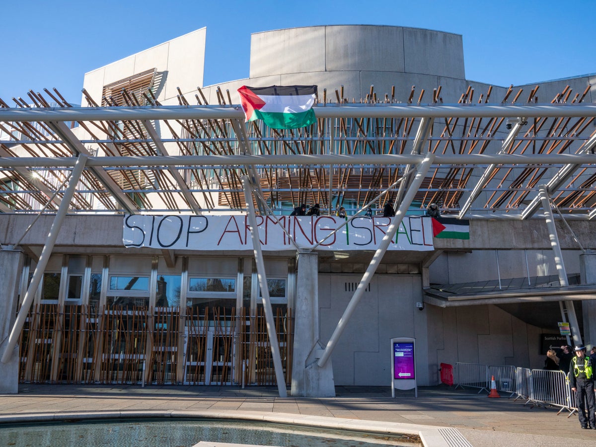 Protesters scale Scottish Parliament to hang pro-Palestine banner