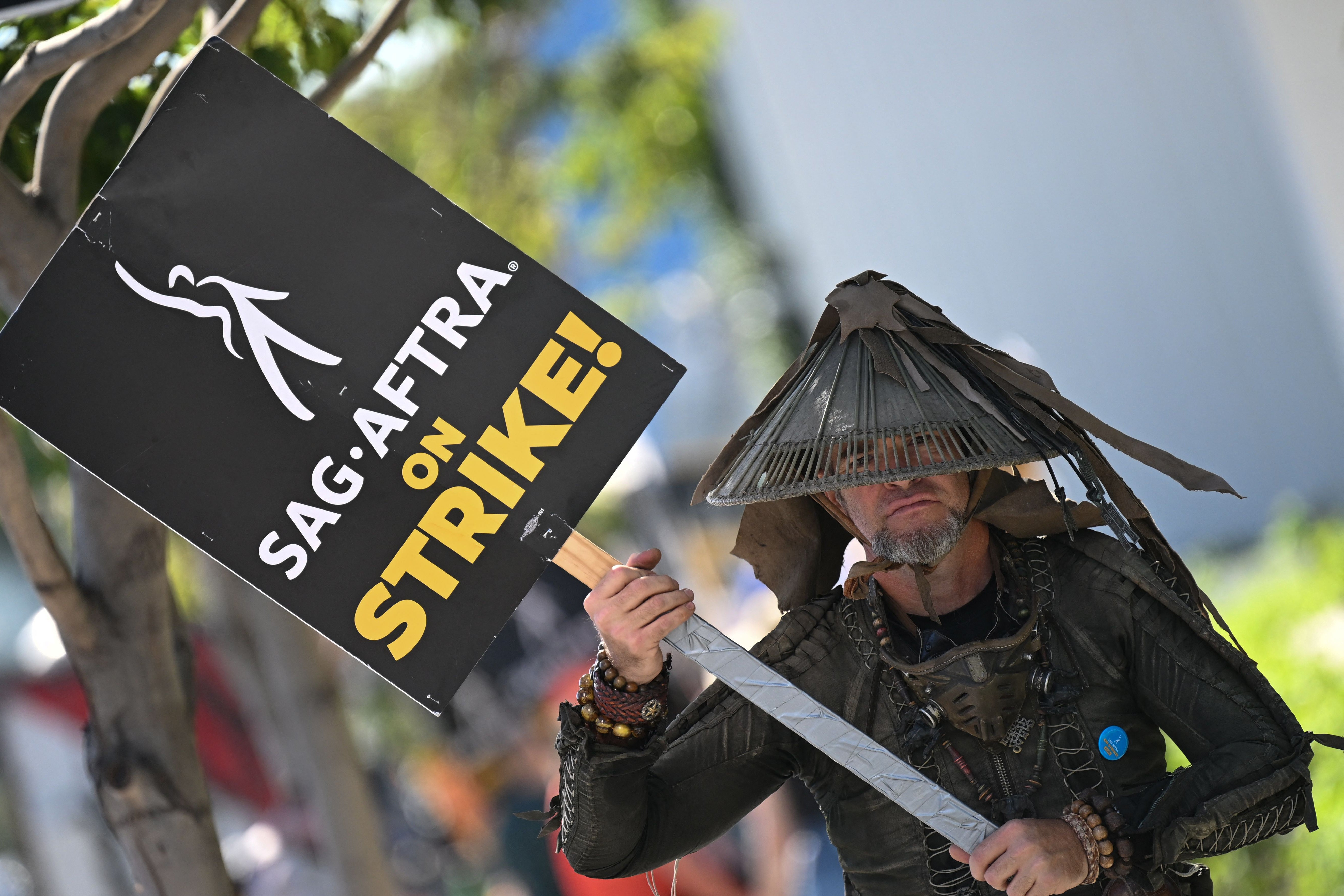 Standing ground: a Sag-Aftra picketer outside Netflix headquarters on 8 November