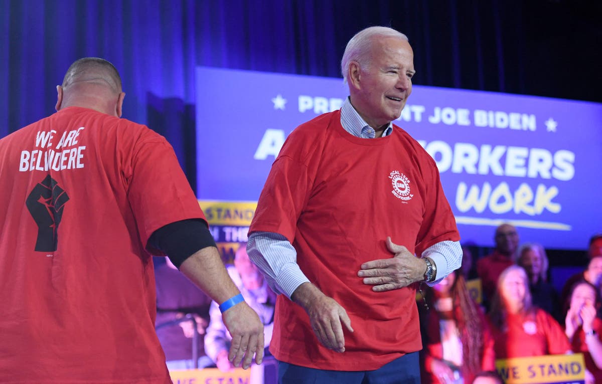 Biden jokes about his past falls in speech to auto union