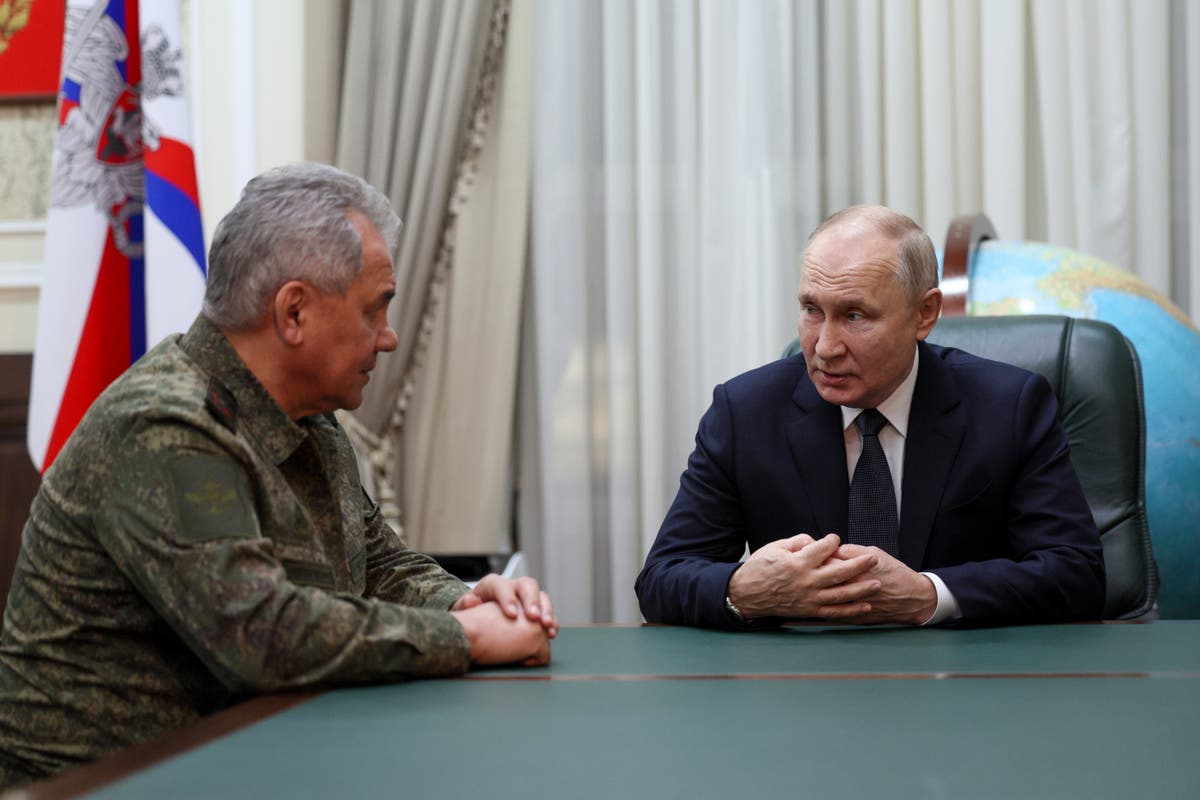 Putin and top military leaders visit southern military headquarters to assess his war in Ukraine