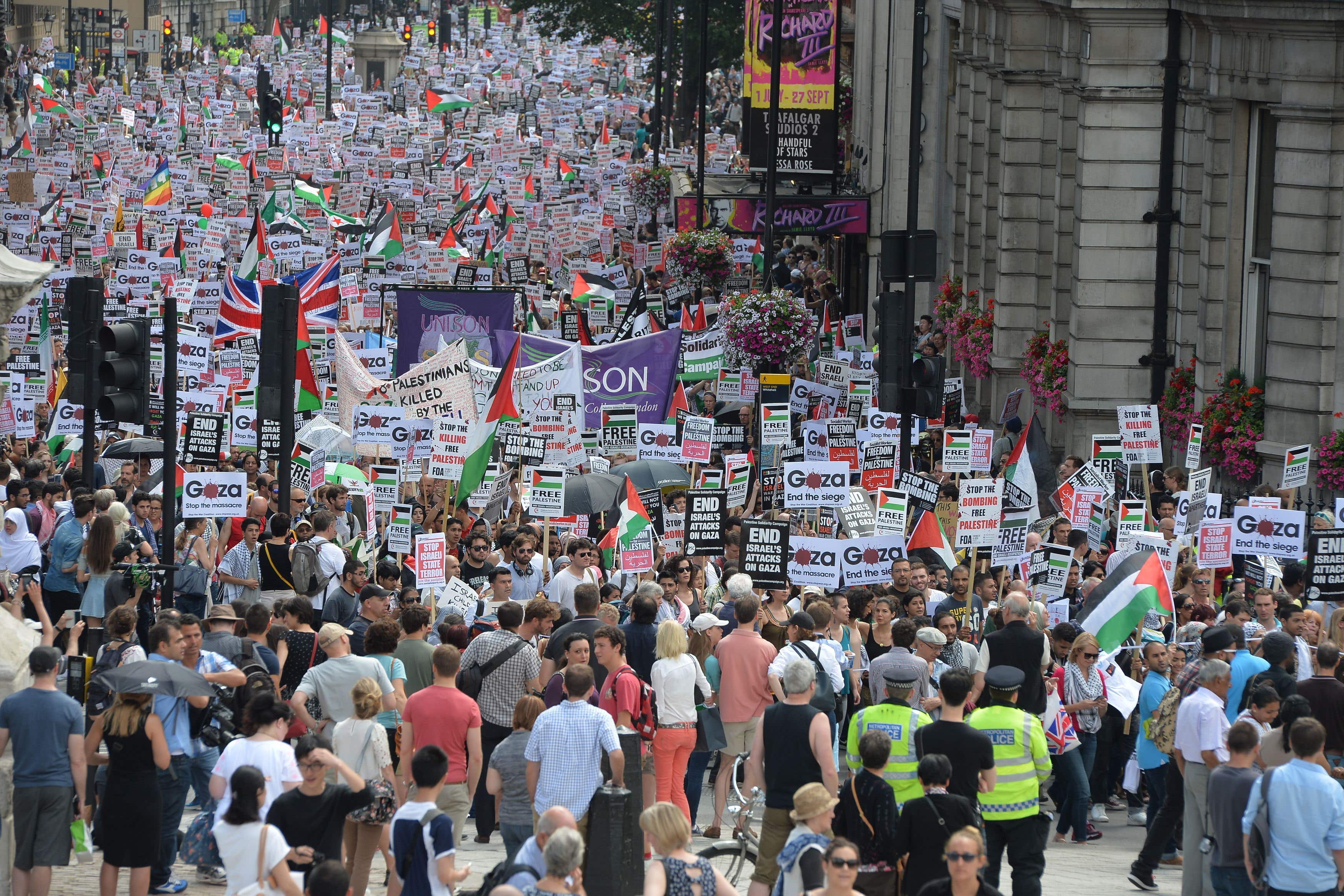 Thousands of protesters march through Whitehall in central London to call for an end to Israeli military action in Gaza (John Stilwell/PA)