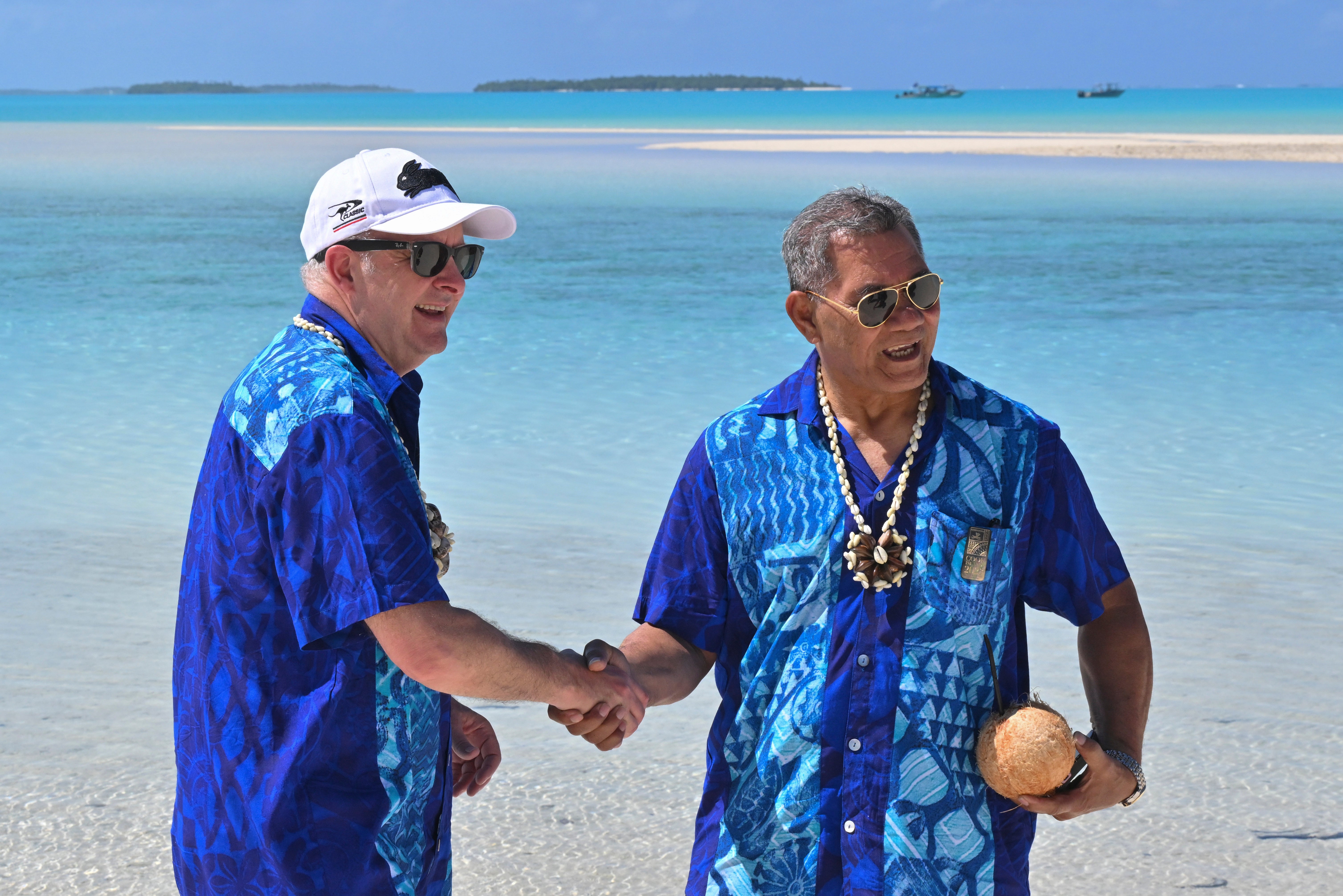 <p>Australia’s Prime Minister Anthony Albanese, left, and Tuvalu’s Prime Minister Kausea shake hands on One Foot Island after attending the Leaders’ Retreat during the Pacific Islands Forum in Aitutaki, Cook Islands</p>