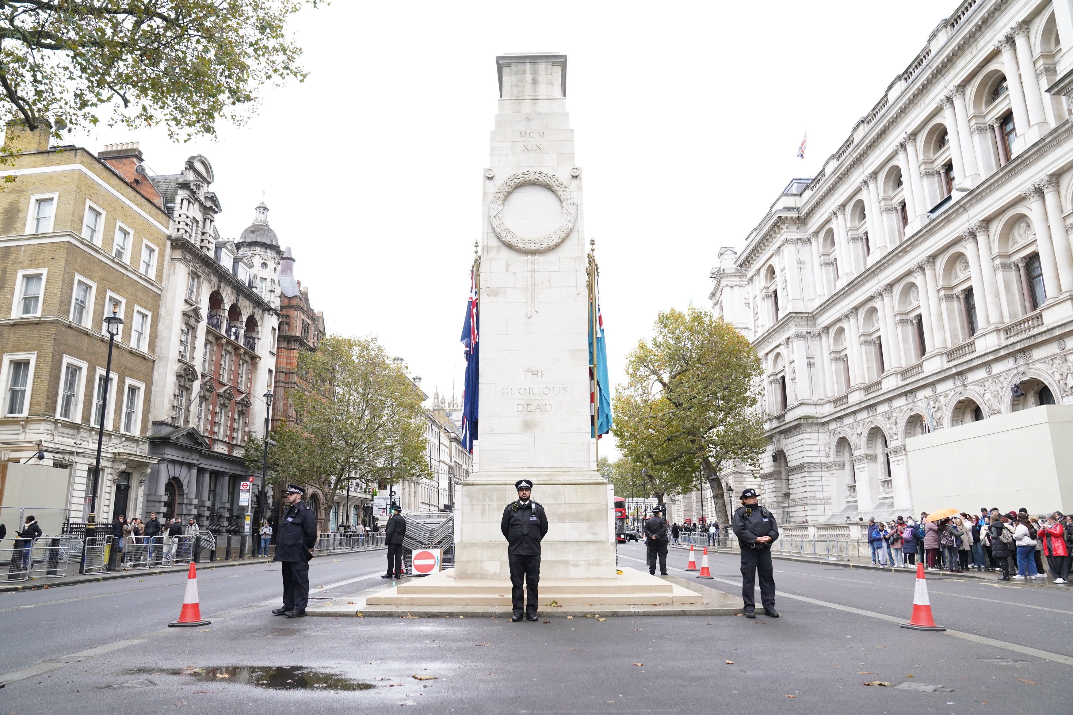Metropolitan Police officers on duty beside the Cenotaph on Whitehall, central London, ahead of marches planned this weekend