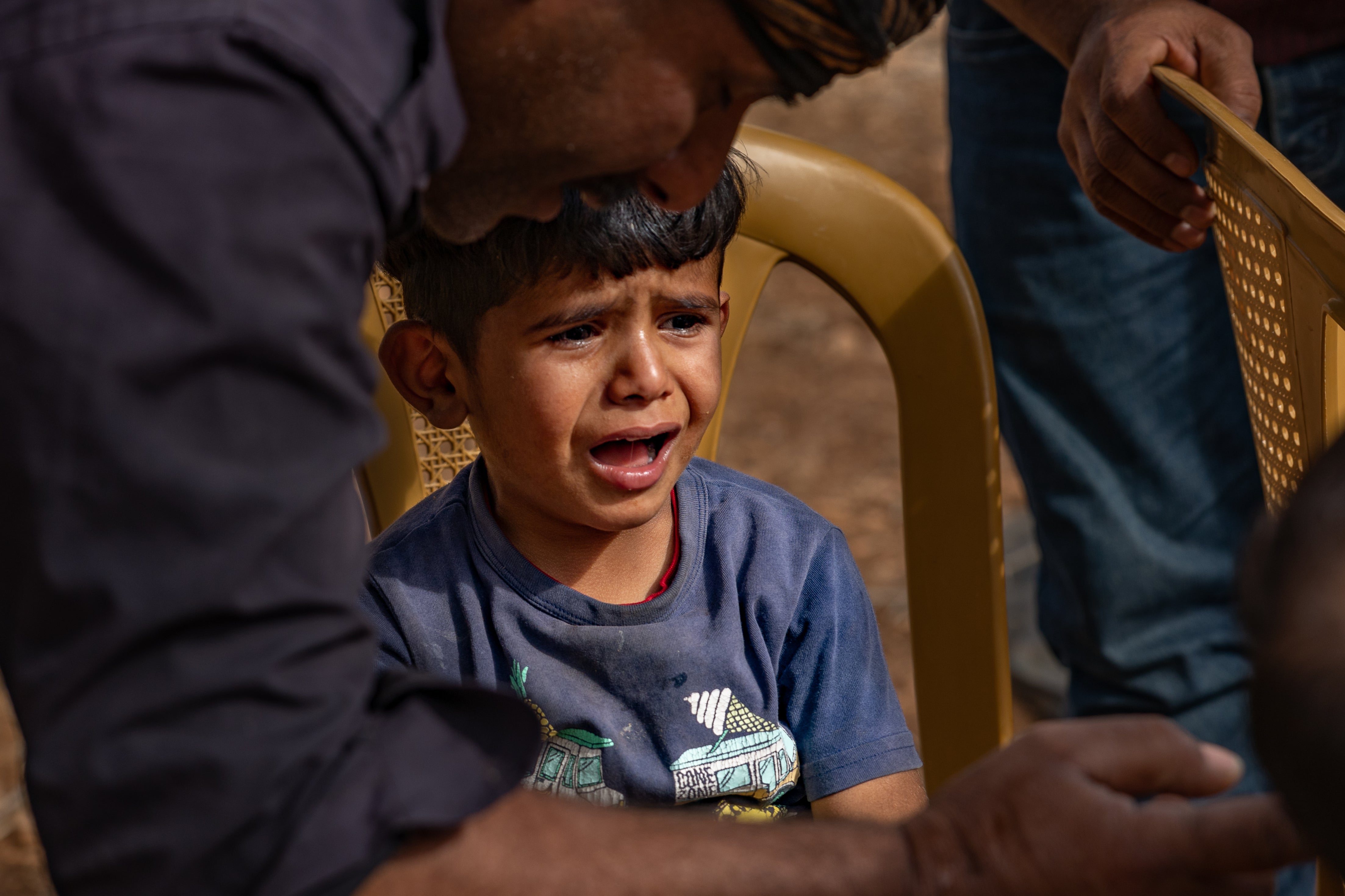 The six-year-old son of Ali Arrara, who has not stopped crying since the family were forced from their land at gunpoint