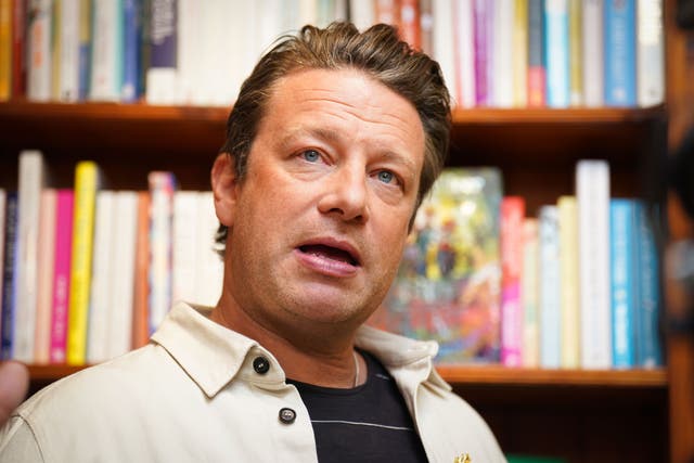 <p>Jamie Oliver photographed in April </p>