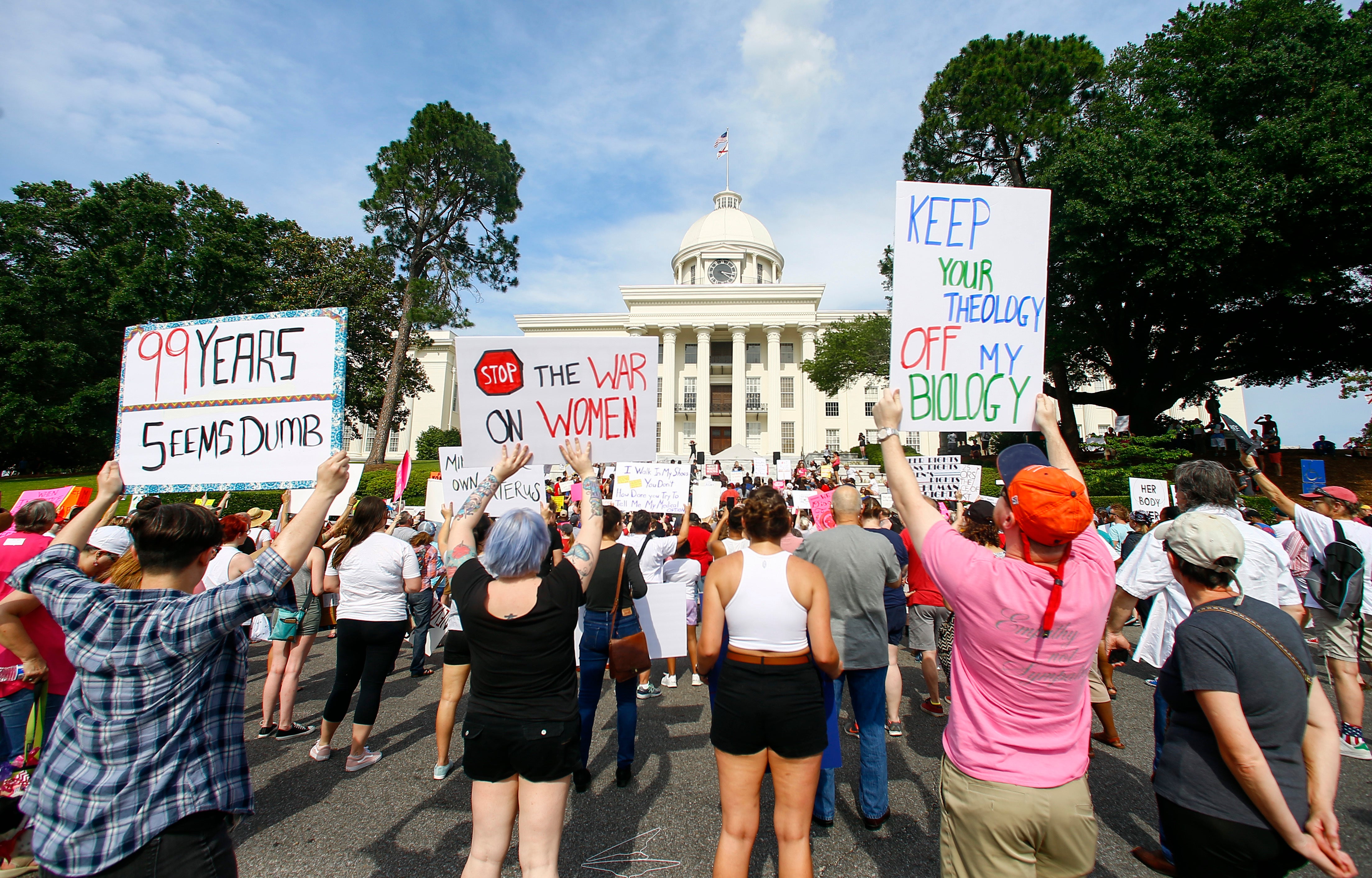 Protesters demonstrate against Alabama’s new ban on IVF