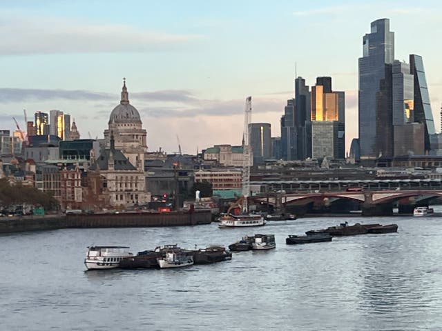 <p>Dirty old river? Thames and City of London from the upper deck of bus SL6 crossing Waterloo Bridge at sunset</p>