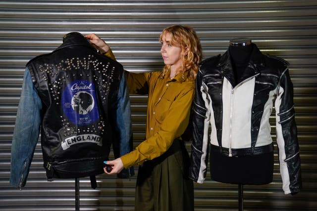 George Michael’s La Rocka Jacket (left) next to Michael Jackson’s custom-made leather jacket (Andrew Matthews/PA)