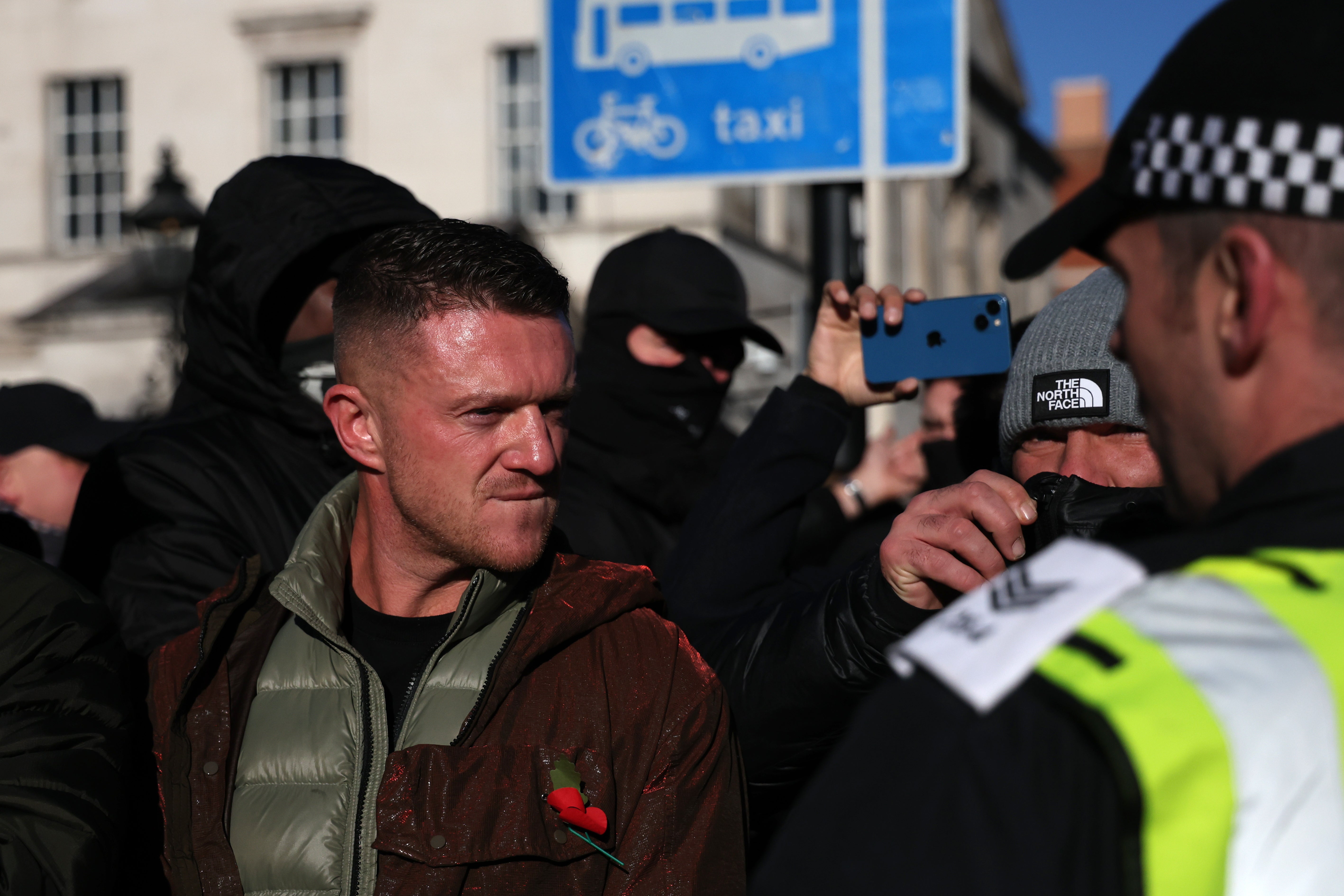 <p>Tommy Robinson leads far-right protesters</p>