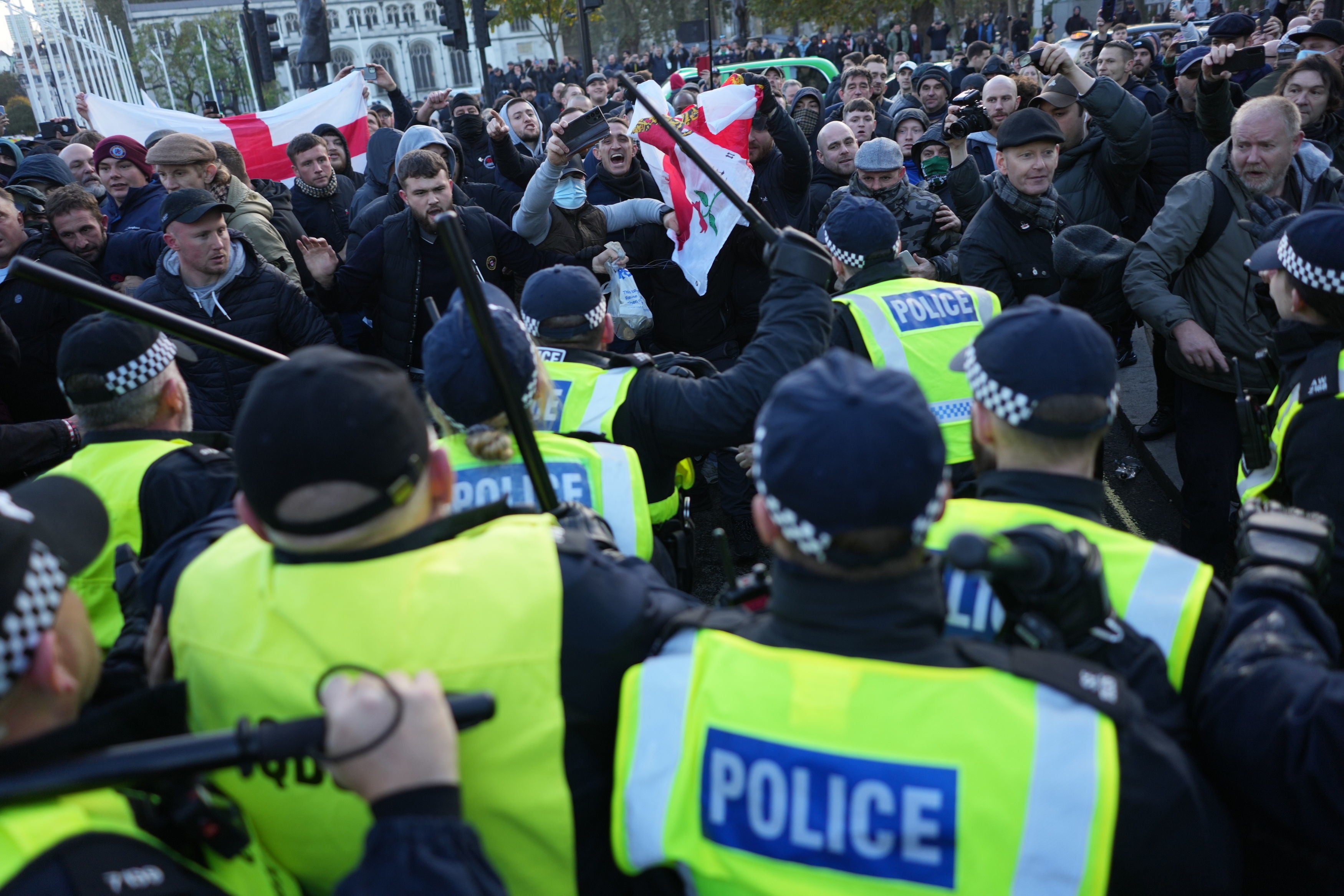 Counter-protesters clash with police in Parliament Square, central London, during the pro-Palestinian march
