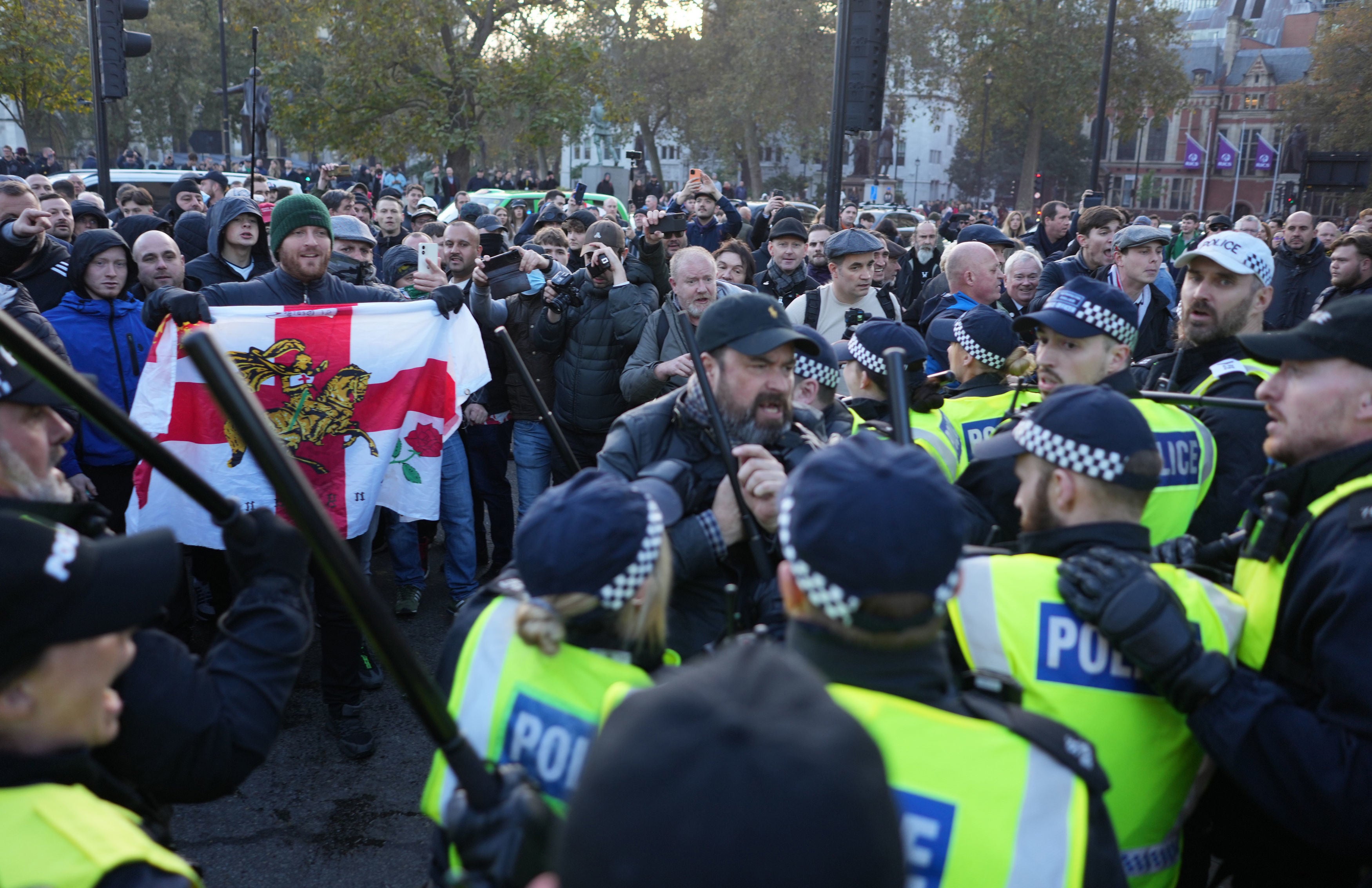Counter-protesters clash with police in Parliament Square