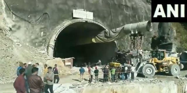 <p>Workers became trapped after an under-construction tunnel collapses in Uttarakhand, India</p>