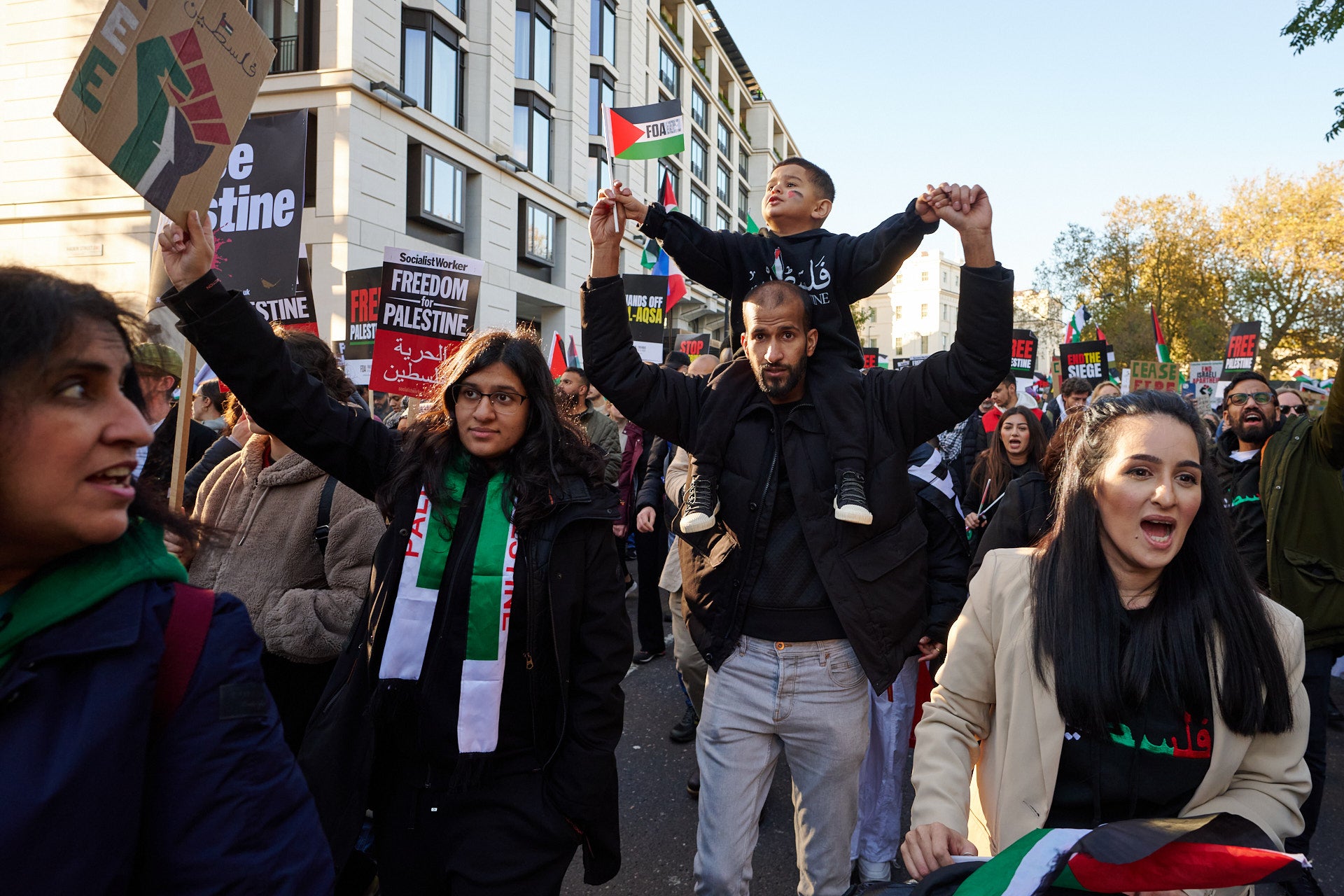 Protesters chant slogans on the Pro-Palestine march near the American Embassy