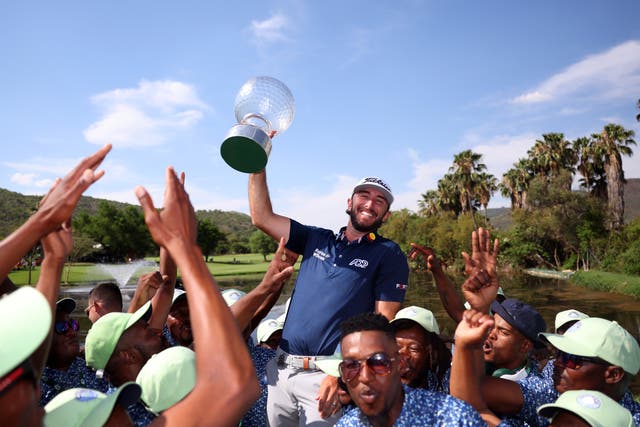 <p>Max Homa of the United States holds the trophy as he celebrates victory at the Nedbank Golf Challenge </p>