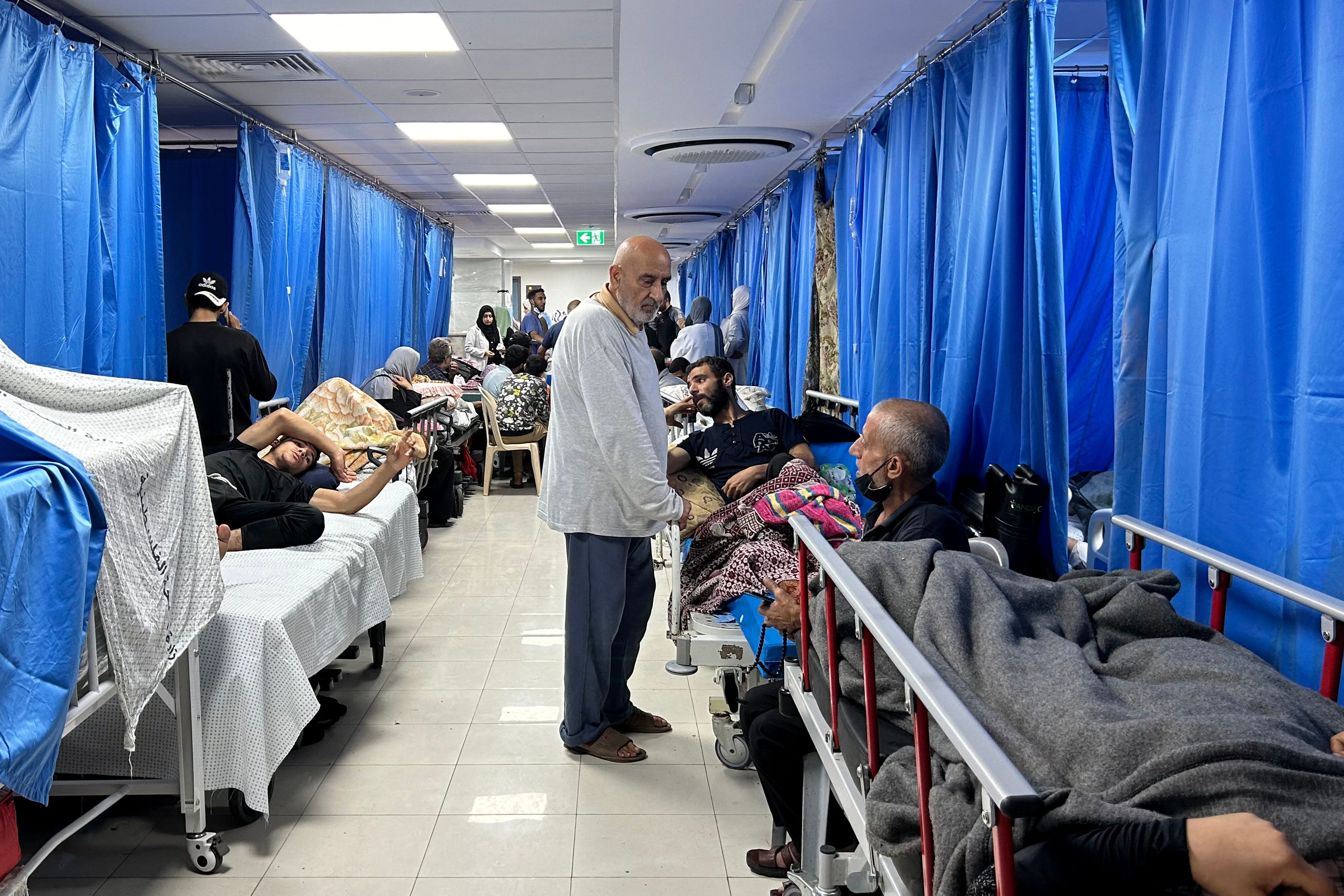 Patients and internally displaced people are pictured at al-Shifa hospital