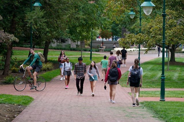 <p>Students walk to and from classes on the Indiana University campus (file image)</p>