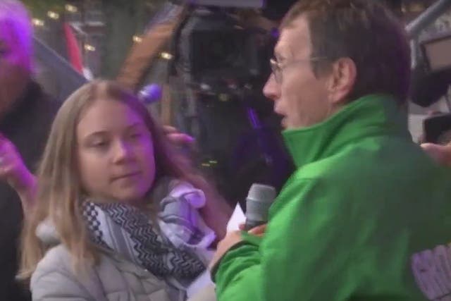 <p>Moment a man grabs microphone from Greta Thunberg</p>