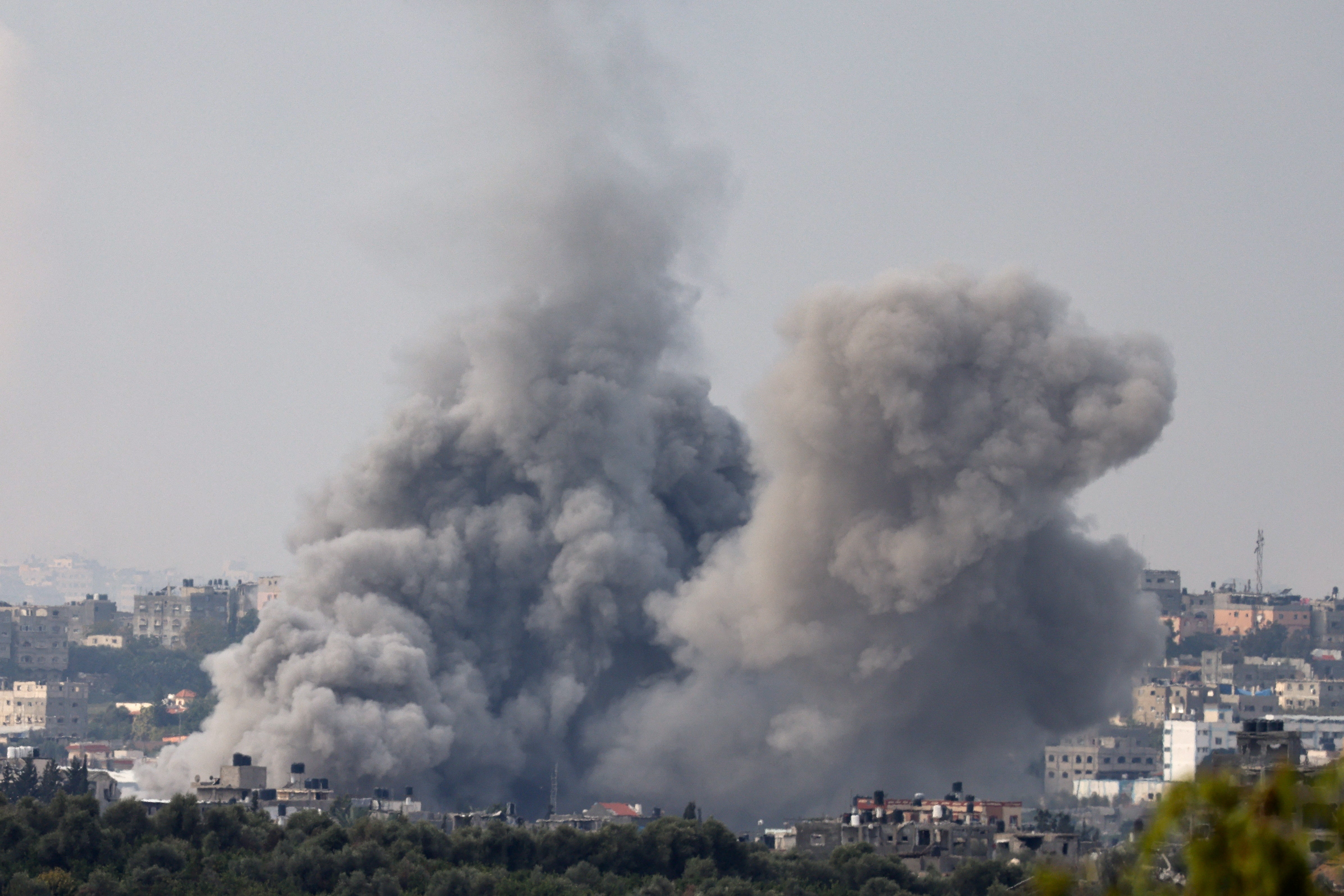 Smoke rises above Gaza, amid the ongoing conflict between Israel and the Palestinian group Hamas, as seen from southern Israel