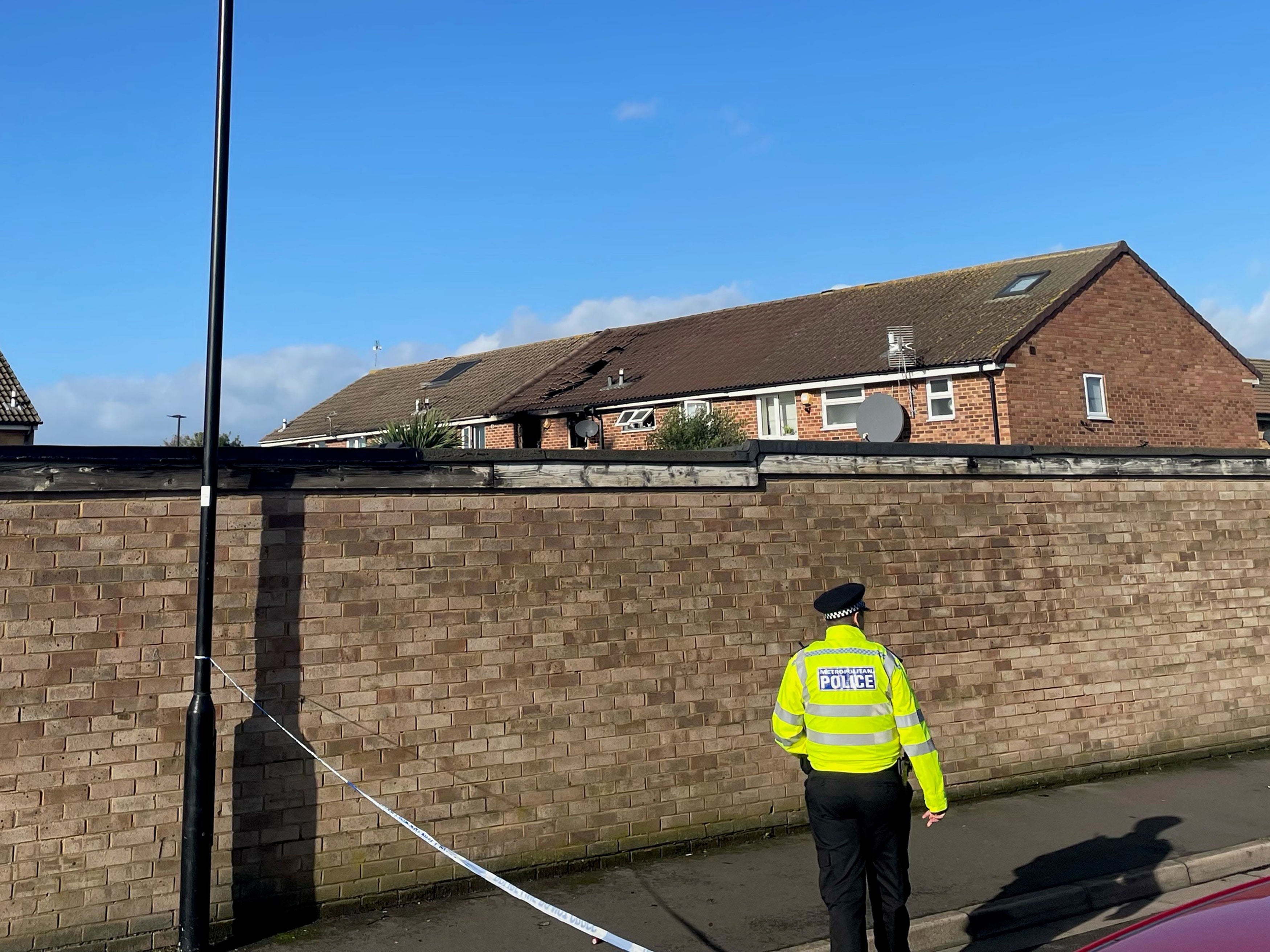 Police at the scene of the fire in Hounslow