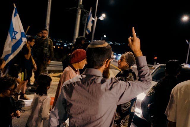 <p>Settlers stage a sit-in at the main intersection in front of the Shavei Shomron settlement, closing traffic to Palestinian cars, as well as the only road to Nablus from the south of the West Bank</p>