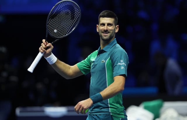 <p>Novak Djokovic celebrates match point against Holger Rune of Denmark in their round robin match at the ATP Finals in Turin on Sunday (12 November) </p>
