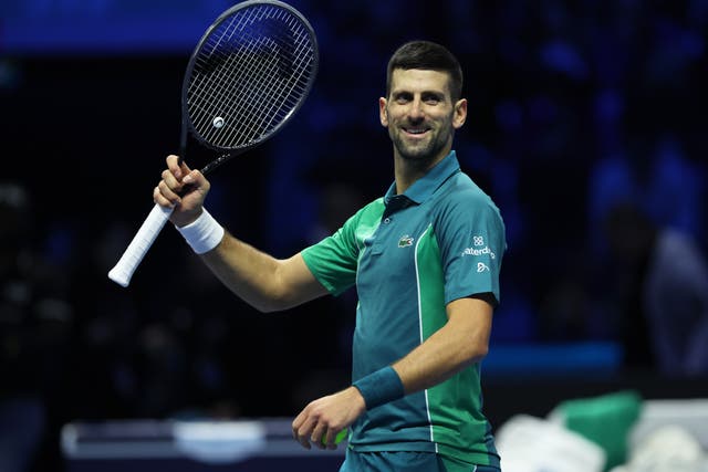 <p>Novak Djokovic celebrates match point against Holger Rune of Denmark in their round robin match at the ATP Finals in Turin on Sunday (12 November) </p>