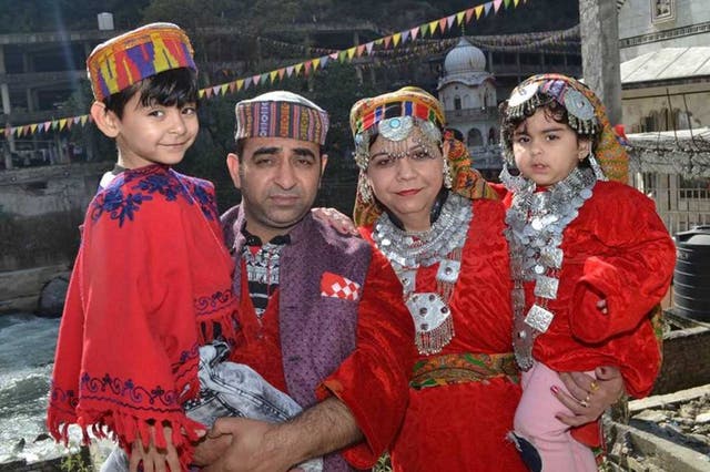 <p>Father Aroen Kishen (second left) is believed to have escaped the fire – three children and their mother Seema Ratra (second right) are feared dead </p>