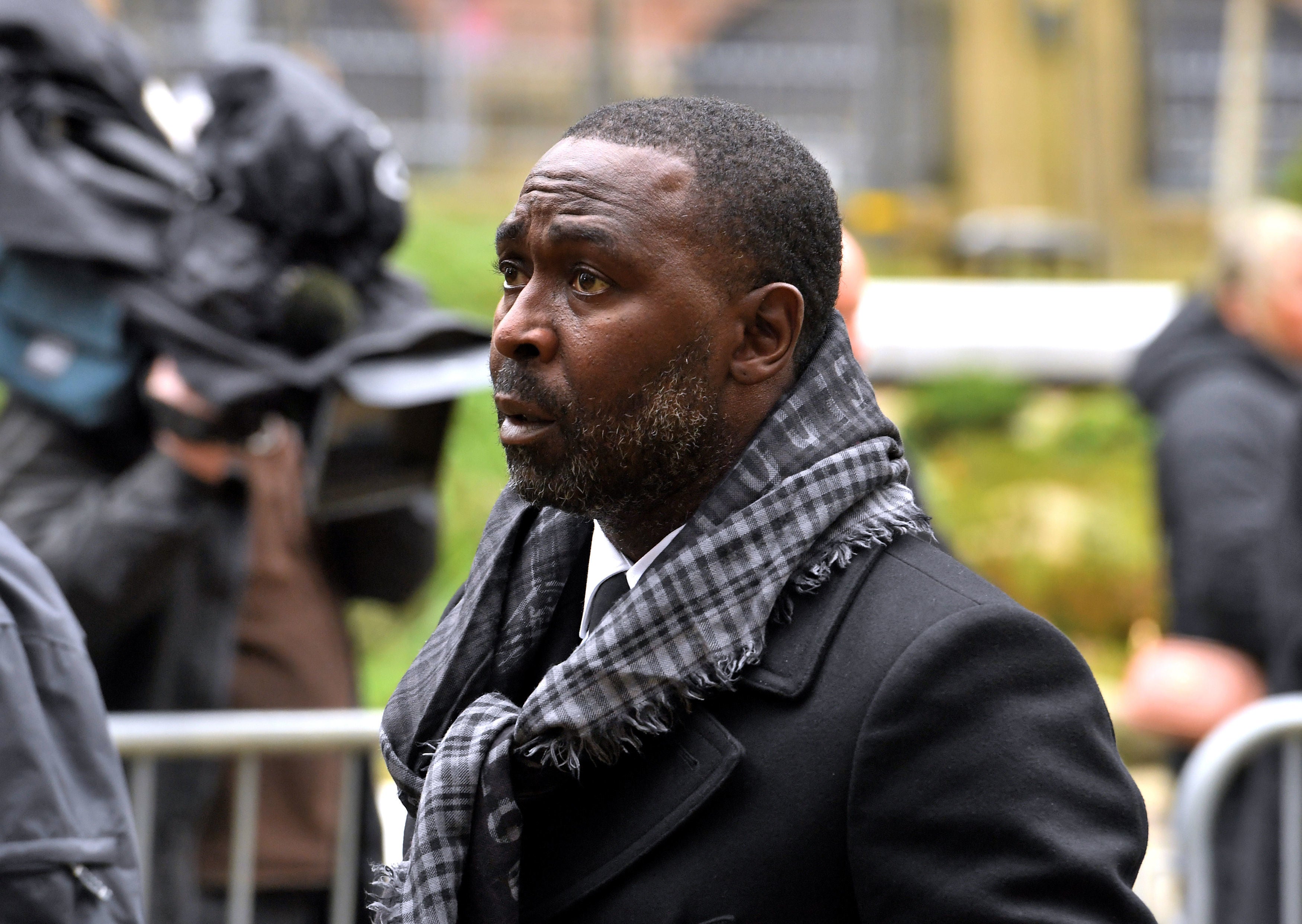 Ex-United striker Andrew Cole attends the service