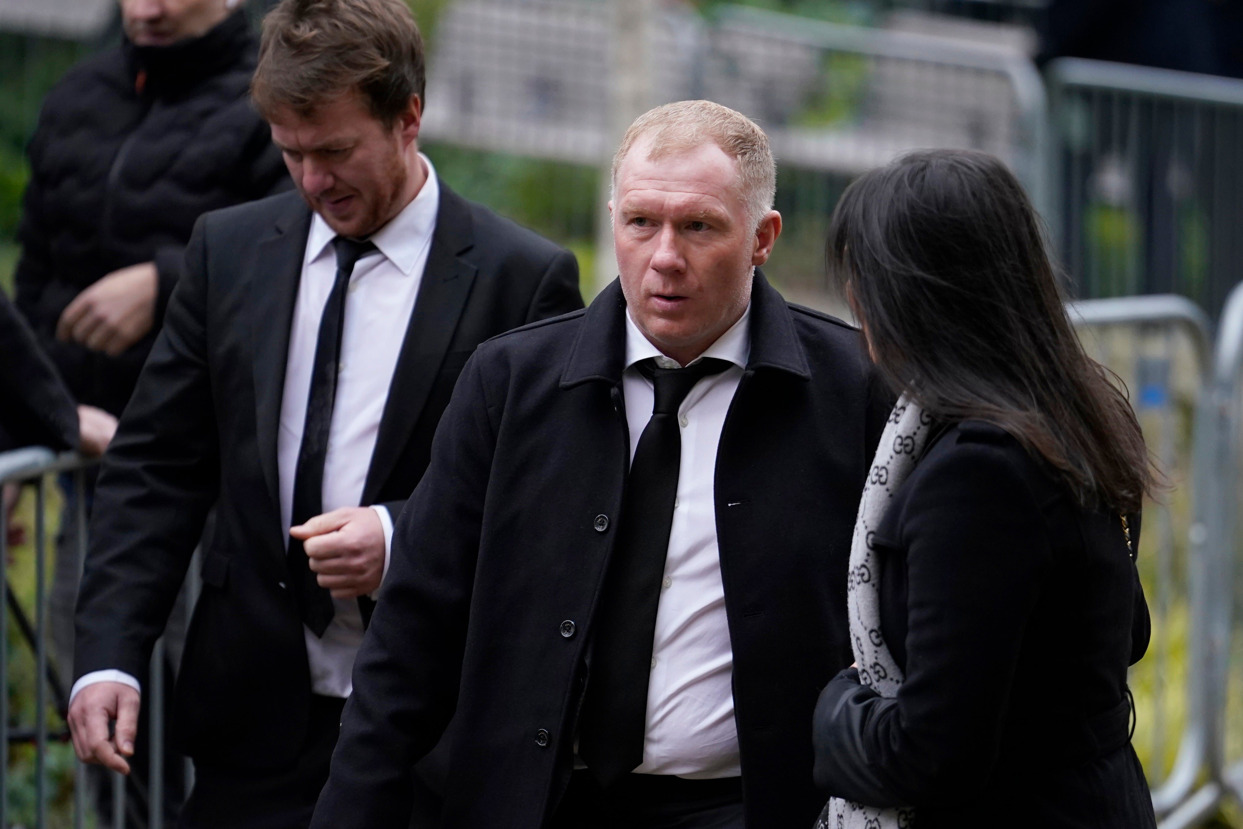 Former midfielder Paul Scholes arrives at the funeral