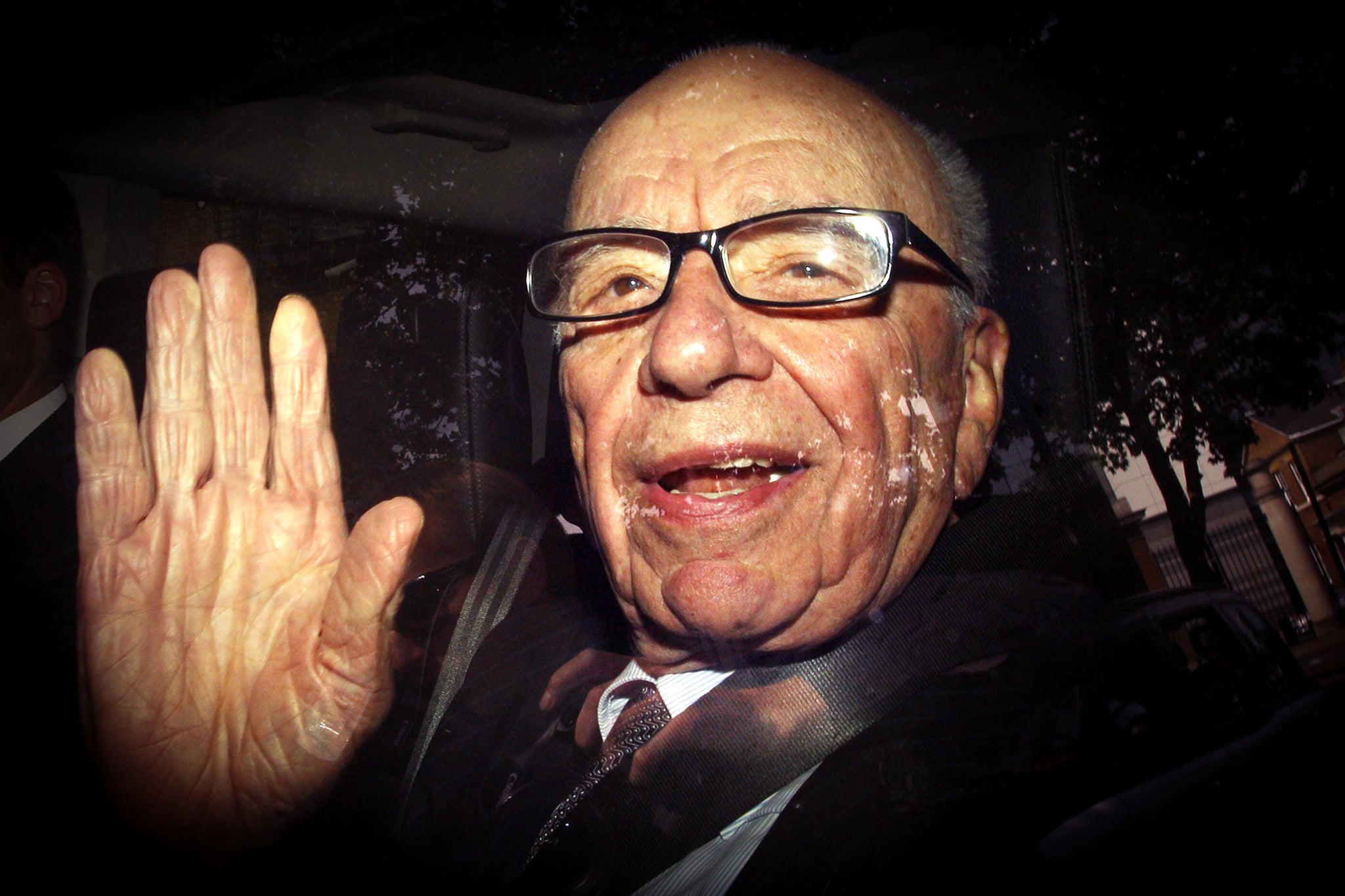 Rupert Murdoch leaving News International headquarters in Wapping, east London, in 2011