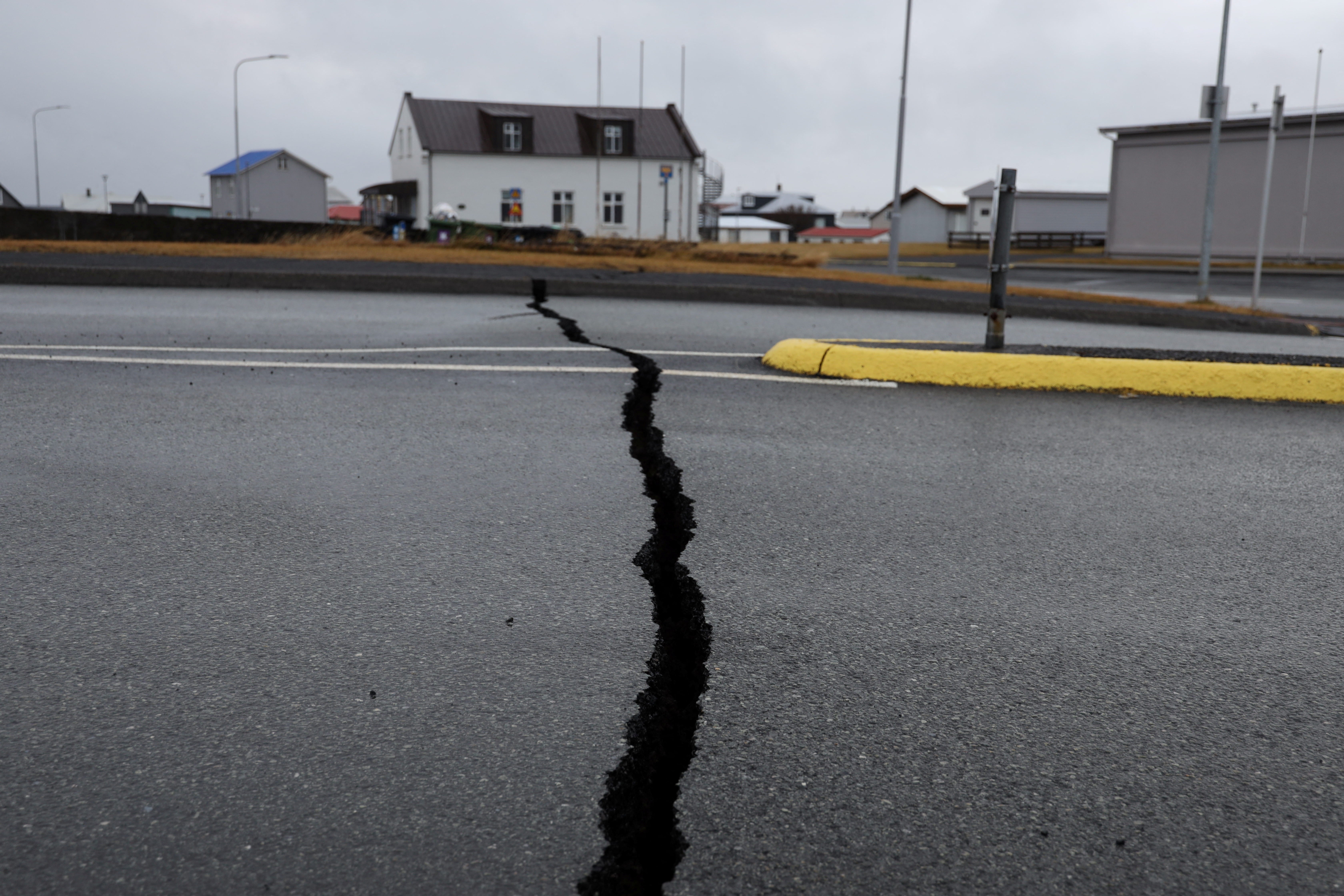 <p>Cracks emerging in the road near Grindavik  </p>