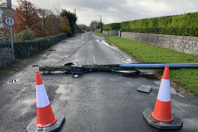 A telegraph pole down on the Maree Rd, Oranmore, Co Galway (PA)