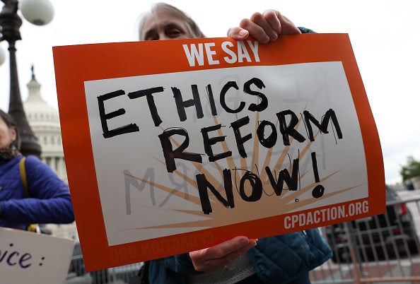 Activists attend a press conference on Supreme Court ethics reform outside of the U.S. Capitol on May 02, 2023