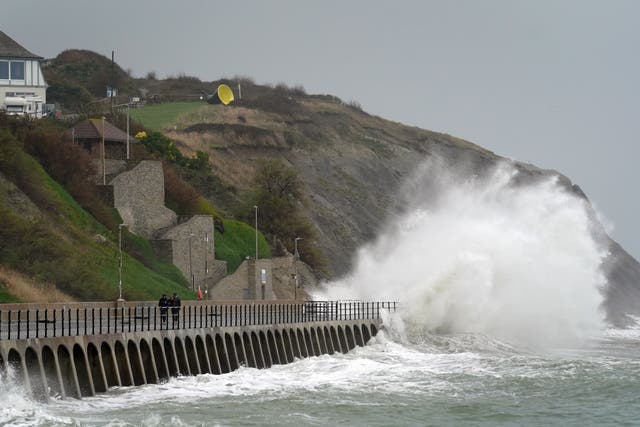 Waves crash over the promenade in Folkestone, Kent (Gareth Fuller/PA)