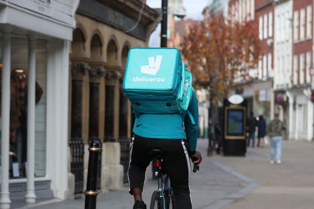 Food delivery giants have been urged to reform their policies (David Davies/PA)