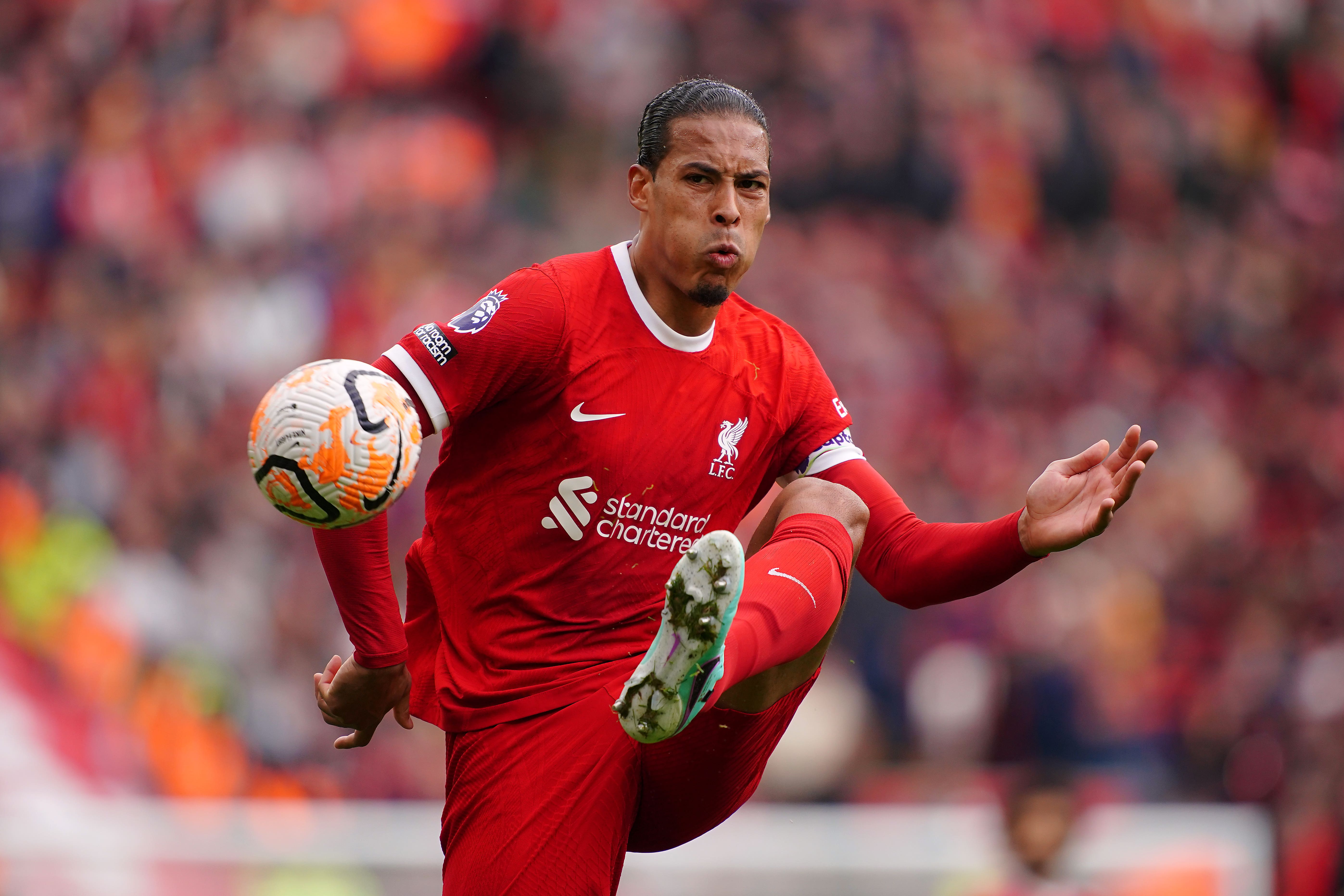 <p>Liverpool captain Virgil van Dijk is hopeful they can challenge Manchester City again (Peter Byrne/PA)</p>