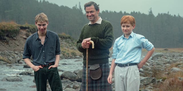 <p>Prince William (Rufus Kampa), Prince Charles (Dominic West) and Prince Harry (Fflyn Edwards) in The Crown.</p>
