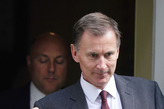 Chancellor Jeremy Hunt responded to shadow chancellor Rachel Reeves at Treasury questions on Tuesday (Aaron Chown/PA)