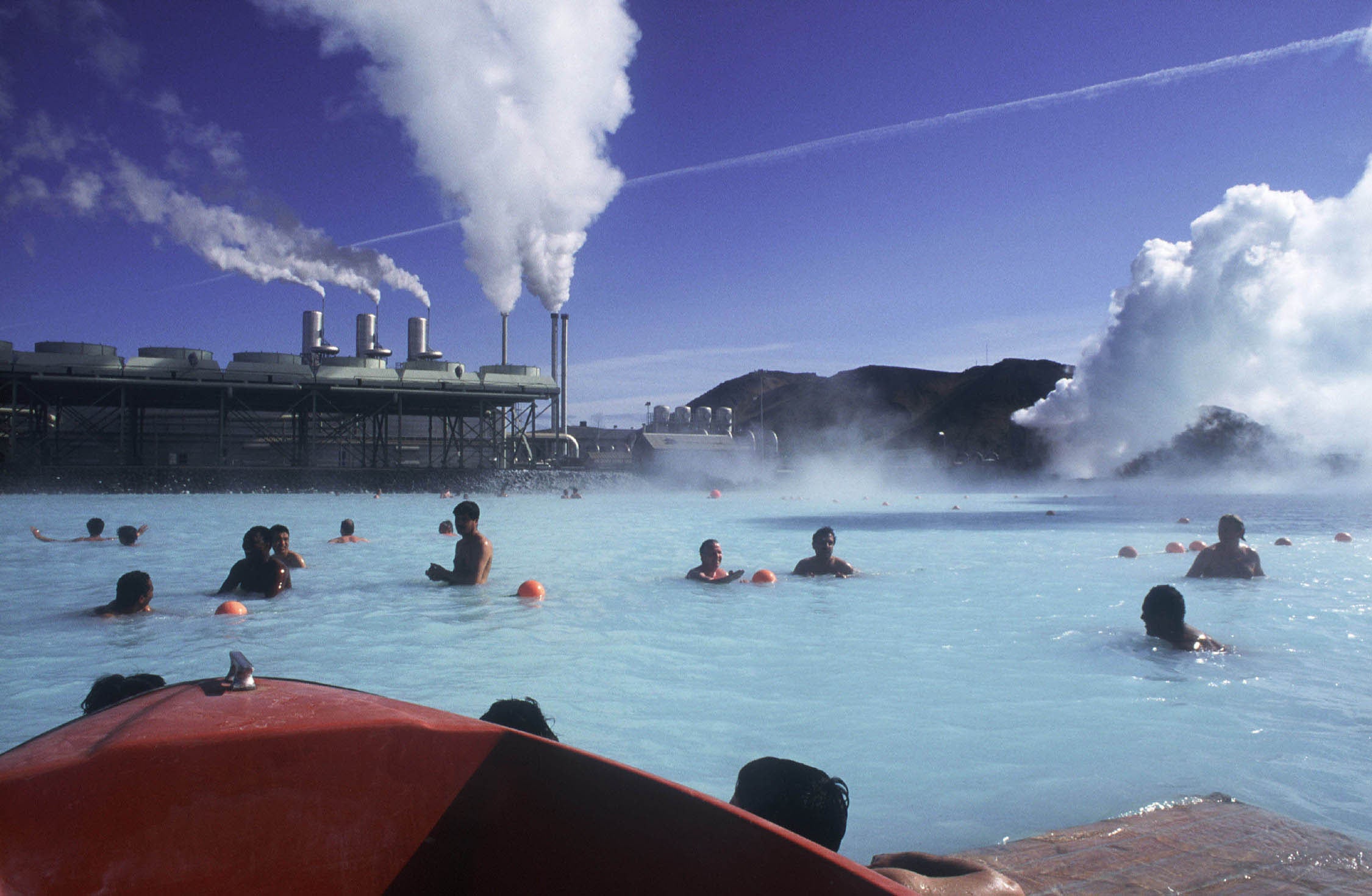 Tourists swimming in the Blue Lagoon hot pool on the Reykjanes Peninsula on Iceland.