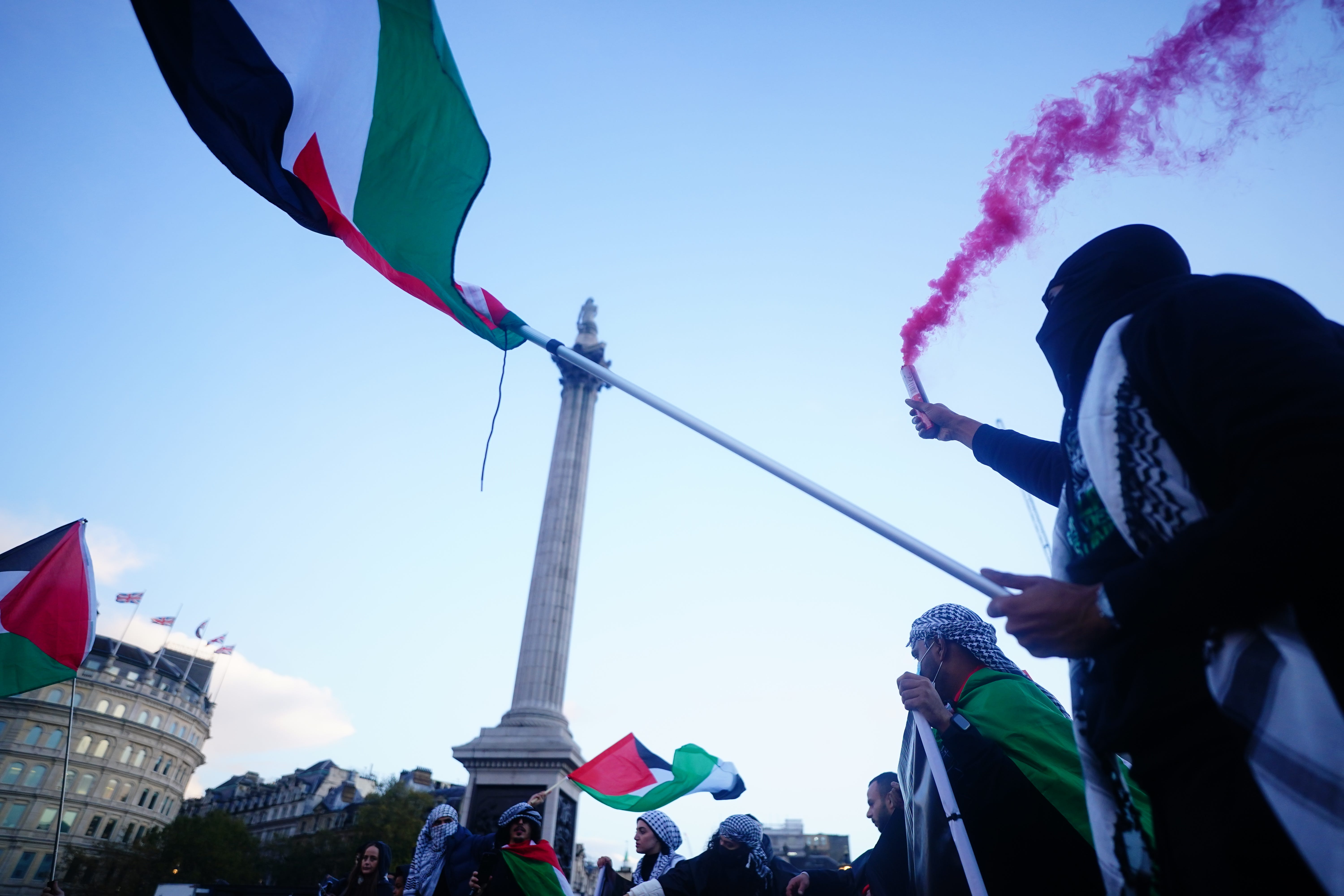 People at a rally in Trafalgar Square (PA)