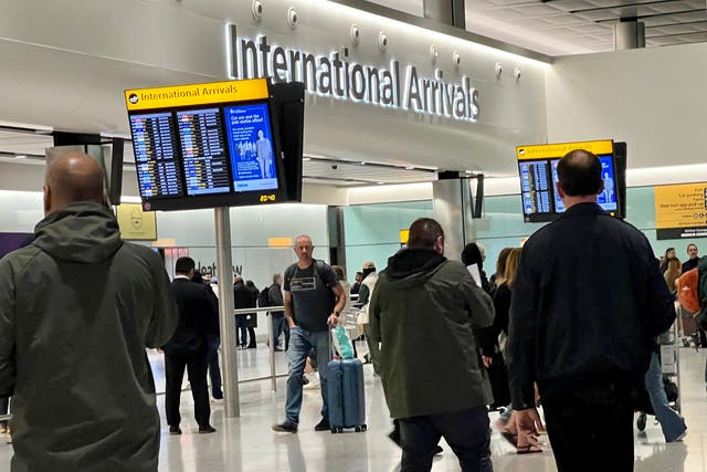<p>Back home: International arrivals at Heathrow Terminal 2 </p>