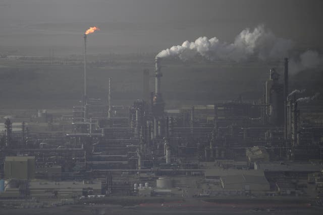 Global greenhouse gas emissions continue to rise despite worsening climatic conditions (Victor R Caivano/AP)