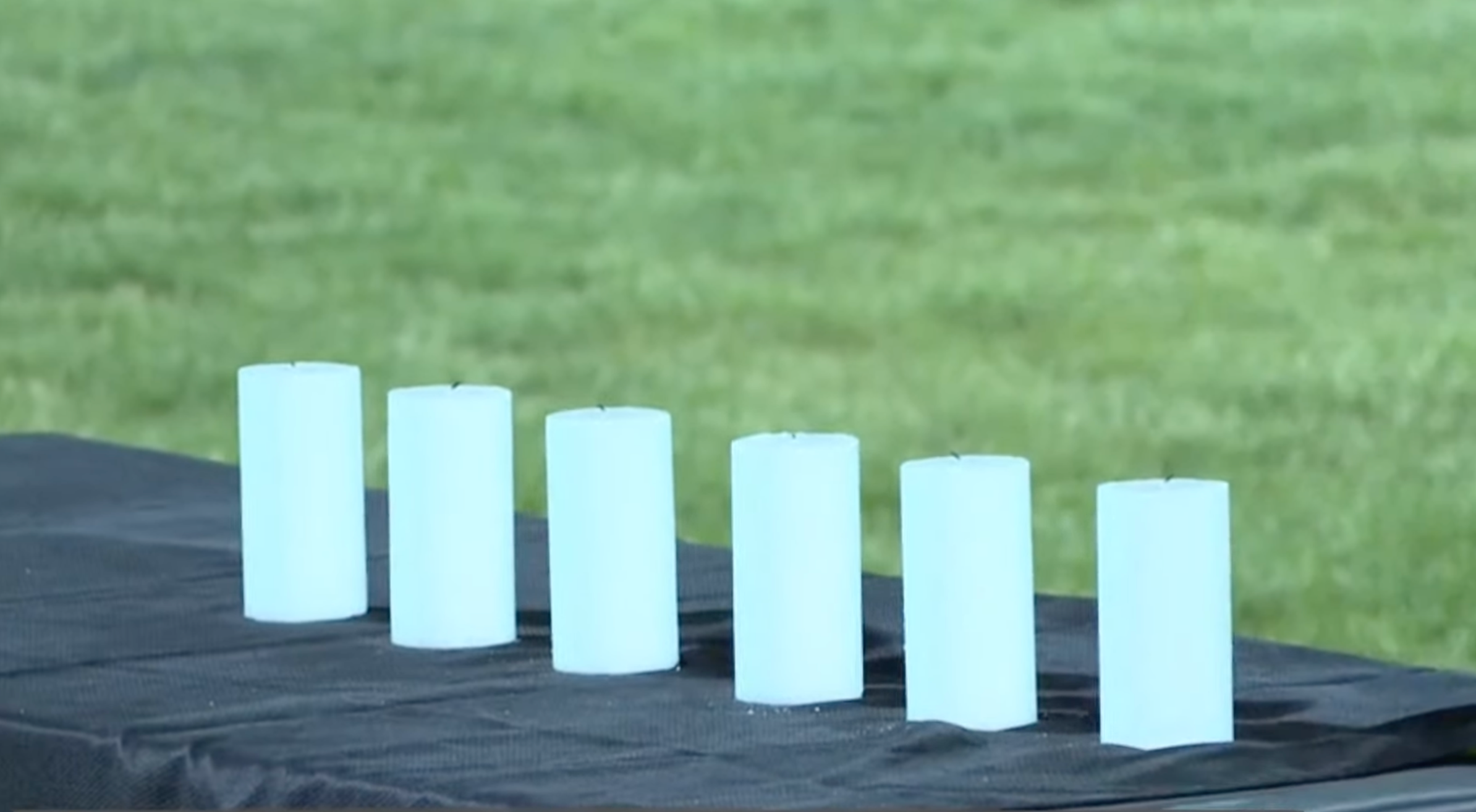 Six candles were lit at the vigil, one for each victim